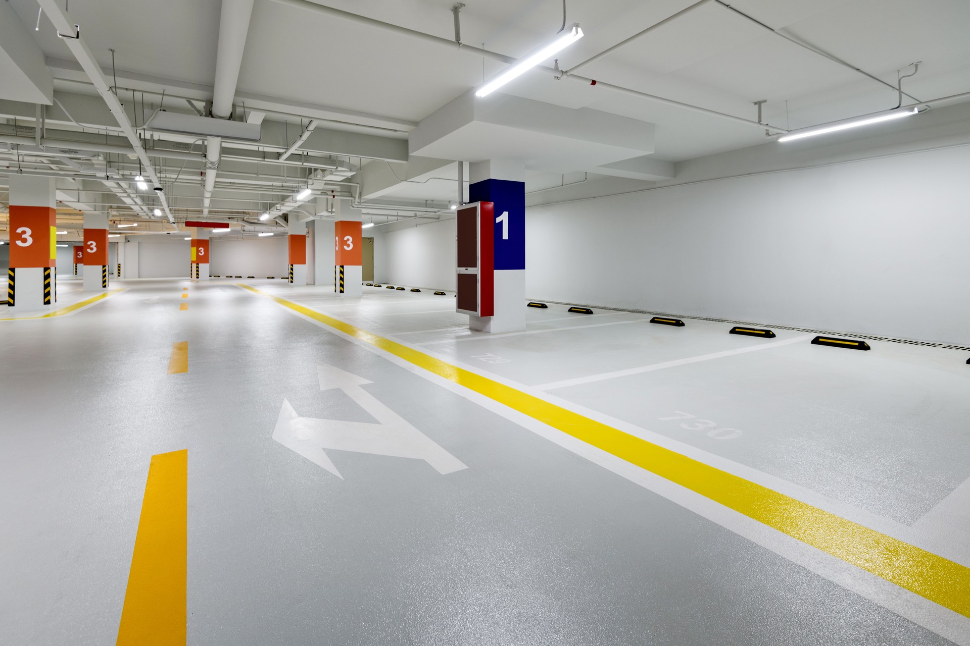 Empty underground parking in modern building